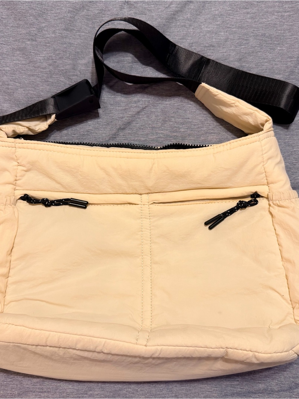 Beige Puffer Crossbody Bag with Black Strap